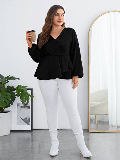 Blusa de gasa negra, manga abullonada ceñida
