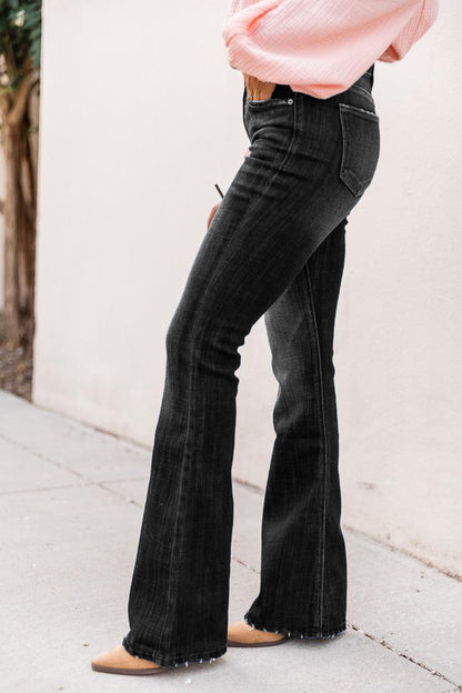 Pantalones acampanados elásticos de cintura alta