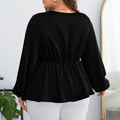 Blusa de gasa negra, manga abullonada ceñida