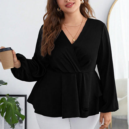 Blusa de gasa negra, manga abullonada ceñida